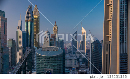 Skyline view of the buildings of Sheikh Zayed Road and DIFC timelapse in Dubai, UAE. Skyline view of the buildings of Sheikh Zayed Road and DIFC timelapse in Dubai, UAE. 138231326
