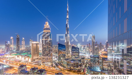 Dubai downtown skyline day to night timelapse with tallest building and Sheikh Zayed road traffic, UAE 138231327