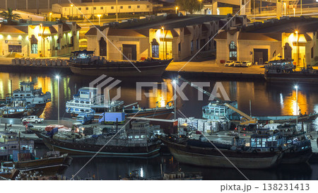Loading a ship in Port Said night timelapse in Dubai, UAE. Loading a ship in Port Said night timelapse in Dubai, UAE. 138231413