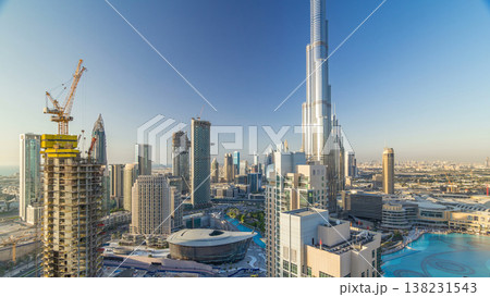 Dubai downtown in the evening timelapse in bright yellow sunset light 138231543