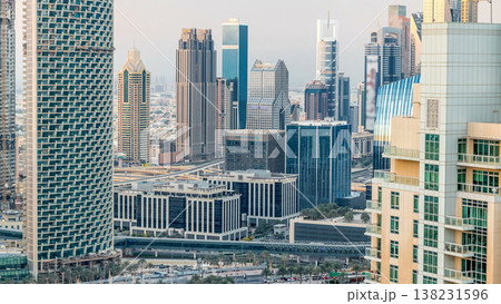 Dubai downtown in the evening timelapse in bright yellow sunset light Dubai downtown in the evening timelapse in bright yellow sunset light 138231596