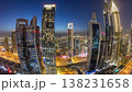 Skyline view of the buildings of Sheikh Zayed Road and DIFC day to night timelapse in Dubai, UAE. 138231658