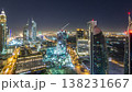Skyline view of the buildings of Sheikh Zayed Road and DIFC night timelapse in Dubai, UAE. 138231667