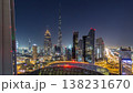 Dubai downtown skyline night timelapse with tallest building and Sheikh Zayed road traffic, UAE 138231670