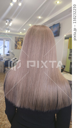 Blonde hair. Hair coloring and drying process at a beauty salon. Medium length. Blonde hair. Hair coloring and drying process at a beauty salon. Medium length. 138232250