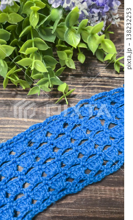 Crocheting a green yarn item. Handmade embellishments Pattern texture Copy space 138232253