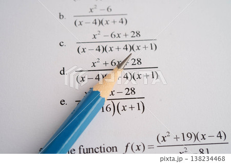 Pencil on mathematic formula exercise test paper in education school. Pencil on mathematic formula exercise test paper in education school. 138234468