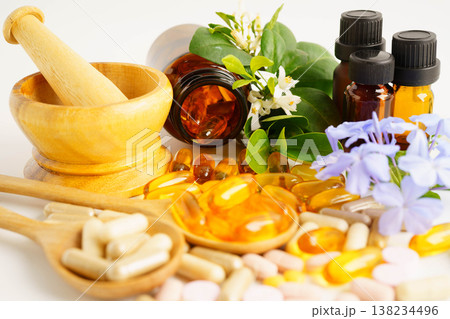Alternative medicine herbal organic capsule with vitamin E omega 3 fish oil, mineral, drug with herbs leaf natural supplements for healthy good life. Alternative medicine herbal organic capsule with vitamin E omega 3 fish oil, mineral, drug with herbs leaf natural supplements for healthy good life. 138234496
