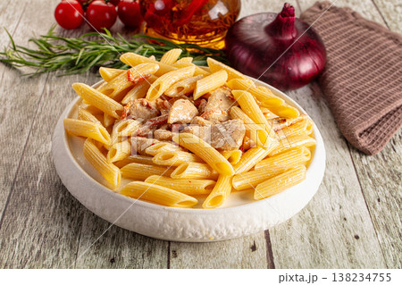 Pasta penne with chicken in cream sauce Pasta penne with chicken in cream sauce 138234755