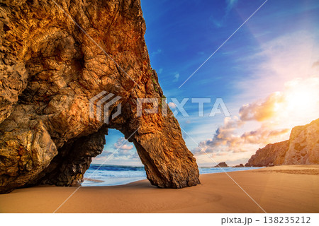 Praia da Adraga Coastal Archway in Sintra Portugal, beautiful beach with rocks in the sea ocean 138235212
