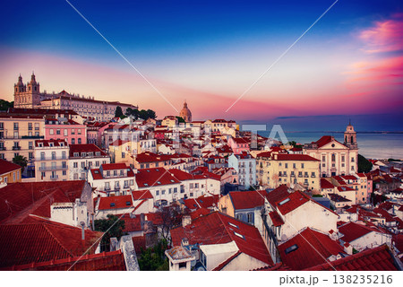 Panoramic View Of Downtown Lisbon Skyline Of The Old Historical City In Portugal, Alfama at sunset Panoramic View Of Downtown Lisbon Skyline Of The Old Historical City In Portugal, Alfama at sunset 138235216