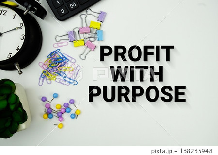 Profit With Purpose message with calculator, alarm clock and Stationery on white background 138235948