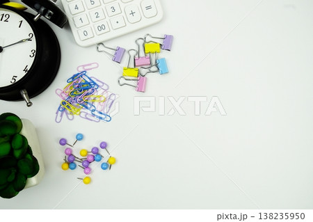 Financial Freedom Requires Planning message with calculator, alarm clock and Stationery on white background 138235950