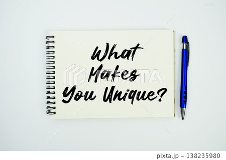 What Makes You Unique? message written on notepad with pen on white background What Makes You Unique? message written on notepad with pen on white background 138235980