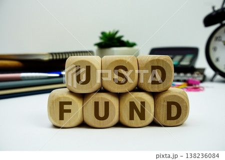 USD Fund alphabet letters with calculator and alarm clock on white background USD Fund alphabet letters with calculator and alarm clock on white background 138236084