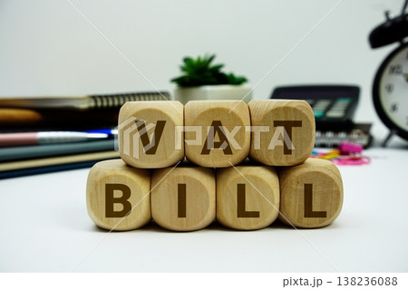 VAT Bill alphabet letters with calculator and alarm clock on white background 138236088