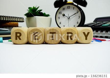 RETRY alphabet letters with alarm clock and calculator on white background RETRY alphabet letters with alarm clock and calculator on white background 138236131
