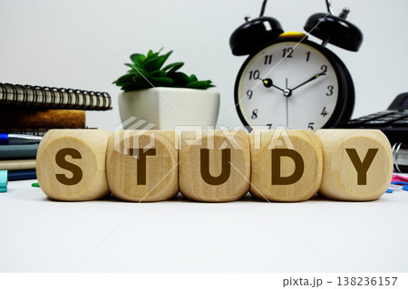STUDY alphabet letters with alarm clock and calculator on white background 138236157