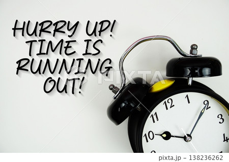 Hurry Up! Time is Running Out! text with alarm clock flat lay on white background Hurry Up! Time is Running Out! text with alarm clock flat lay on white background 138236262