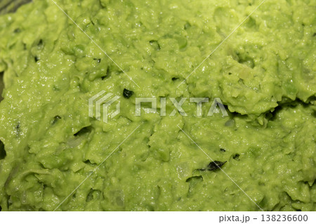 Close up of freshly made mushy pea green sauce side dish 138236600