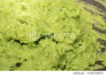 Close up of freshly made mushy pea green sauce side dish 138236601