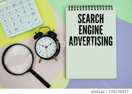 Search Engine Advertising text with calculator, alarm clock and magnifying glass 138236857
