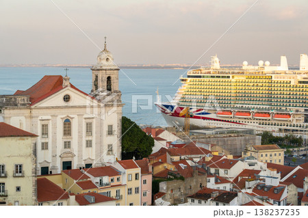 Alfama Oldest Neighborhood and Cruise Ship at Sunset. Lisbon, Portugal Alfama Oldest Neighborhood and Cruise Ship at Sunset. Lisbon, Portugal 138237235