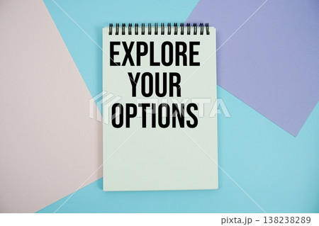 Explore Your Options text written on notepad flat lay on multicolor pastel background 138238289