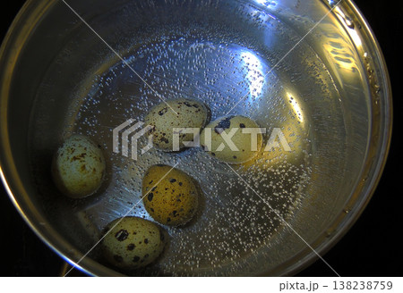 Quail Eggs Boiling In Aluminium Cooking Pan   138238759