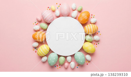 Easter eggs circle frame, colorful decorated eggs on pink background, festive holiday symbol Easter eggs circle frame, colorful decorated eggs on pink background, festive holiday symbol 138239310