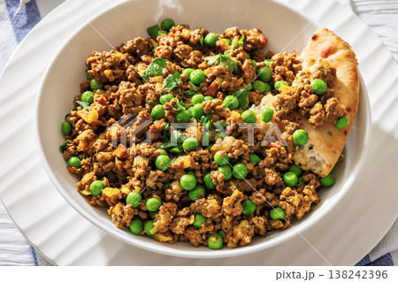 keema matar with minced meat, peas and naan 138242396