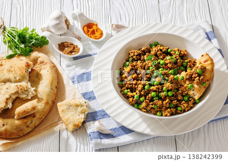 keema matar with minced meat, peas and naan 138242399