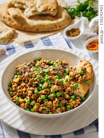 keema matar with minced meat, peas and naan 138242401