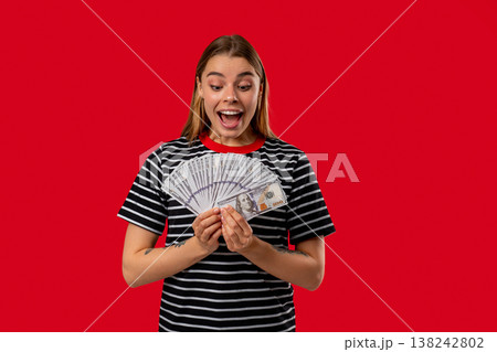 Rich Blonde Woman With Usd Cash Money Dollars Banknotes On Red, Income Payment Rich Blonde Woman With Usd Cash Money Dollars Banknotes On Red, Income Payment 138242802