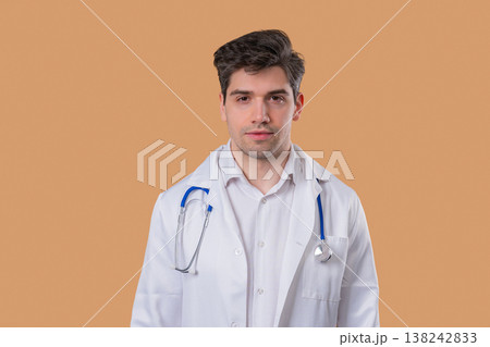 Caring handsome doctor looks at camera, listening with empathy and understanding Caring handsome doctor looks at camera, listening with empathy and understanding 138242833