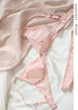 Woman's lingerie on the bed sheets. Lace sexy female underwear. Beauty, fashion blogger concept. Female bra, panties, erotic clothes. Lingerie advertising 138243078