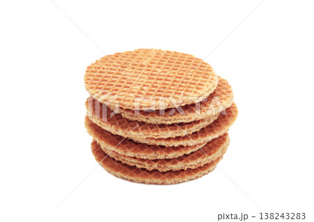 Stack of Dutch stroopwafel cookies or caramel waffles isolated on white. Stack of Dutch stroopwafel cookies or caramel waffles isolated on white. 138243283