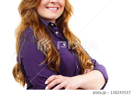 Woman standing with folded arms 138243537