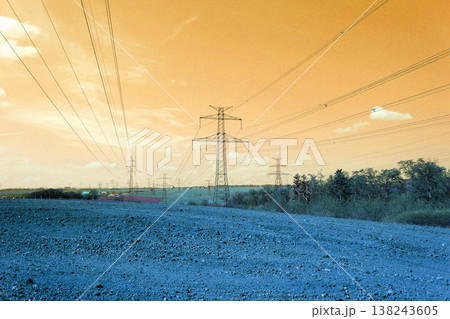 Electricity pylons conducting current from distribution power station, blackout and grid stability concept, copy space Electricity pylons conducting current from distribution power station, blackout and grid stability concept, copy space 138243605