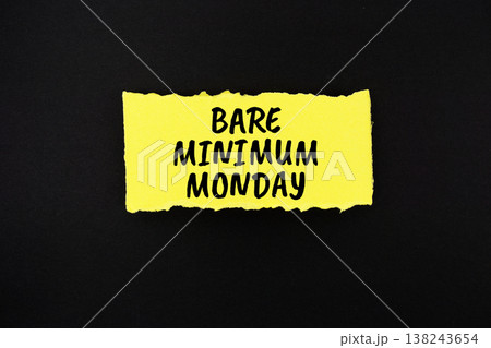Bare Minimum Monday text written on paper rip 138243654