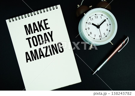 Make Today Amazing text written on notepad with pen and alarm clock Make Today Amazing text written on notepad with pen and alarm clock 138243782