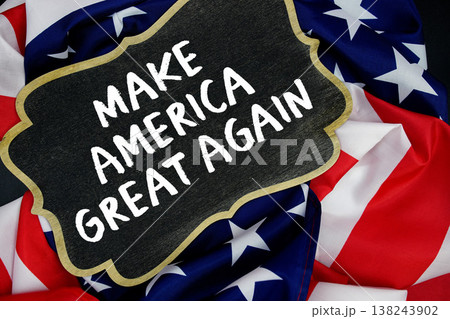 Make America Great Again written on blackboard with USA flag background Make America Great Again written on blackboard with USA flag background 138243902