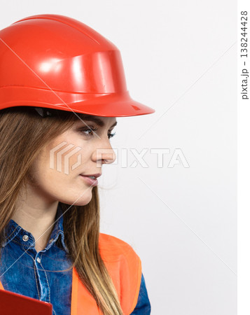 Woman engineer construction builder in helmet. Woman engineer construction builder in helmet. 138244428