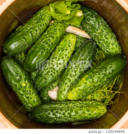 Making pickled cucumbers in clay jar 138244694