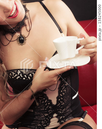 Lady has white tea set. Lady has white tea set. 138245000