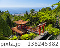 Monte Palace tropical garden with red pagoda, lakes and traditional buildings above the city of Funchal, popular tourist destination in Madeira island, Portugal 138245382