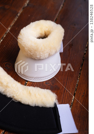 luxery hoof protectors with natural fur for sportive horses. horse stuff and care 138246528
