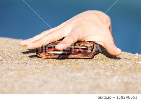 Man thief finding wallet taking stealing it 138246653