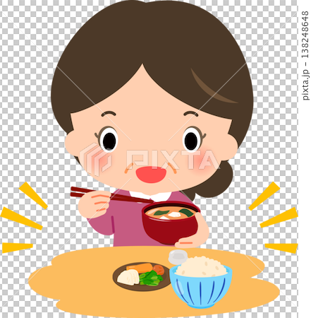 一位中年婦女正在吃米飯、泡菜和味噌湯。 一位中年婦女正在吃米飯、泡菜和味噌湯。 138248648