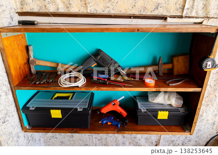 home workshop with tools on a shelf home workshop with tools on a shelf 138253645